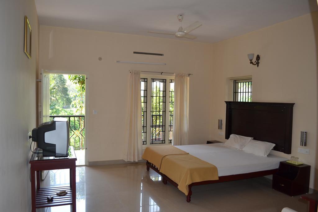 Апартаменты Kerala House Теккади Экстерьер фото