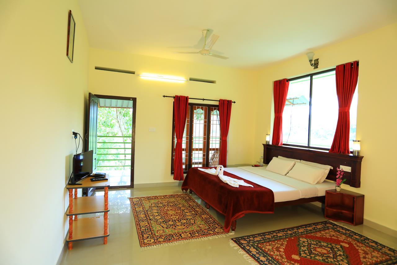 Апартаменты Kerala House Теккади Экстерьер фото